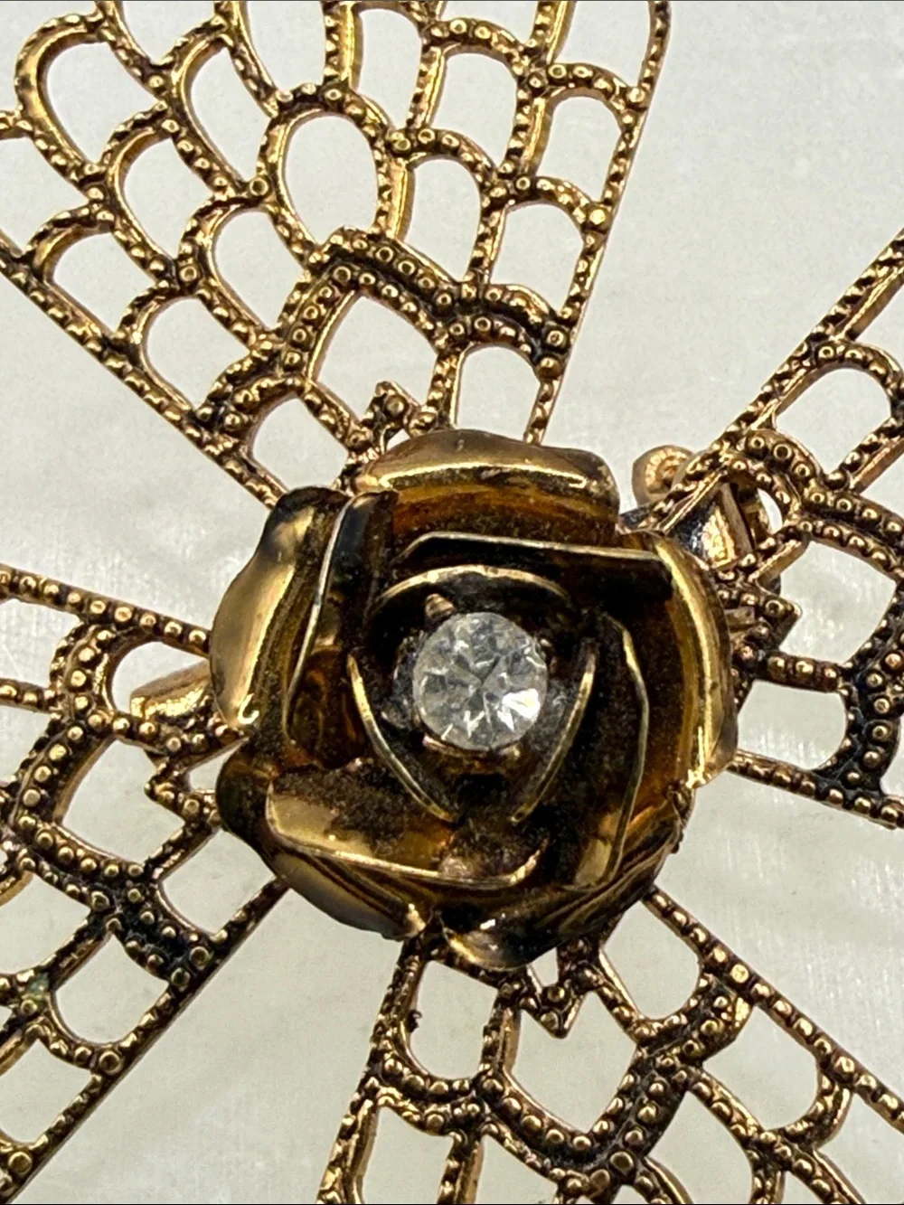 Gold Filigree Floral Brooch with Clear Crystal Center